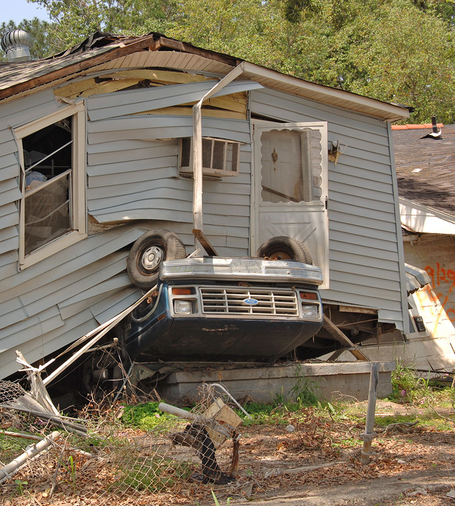 House sits on top of truck after Hurricane Katrina
