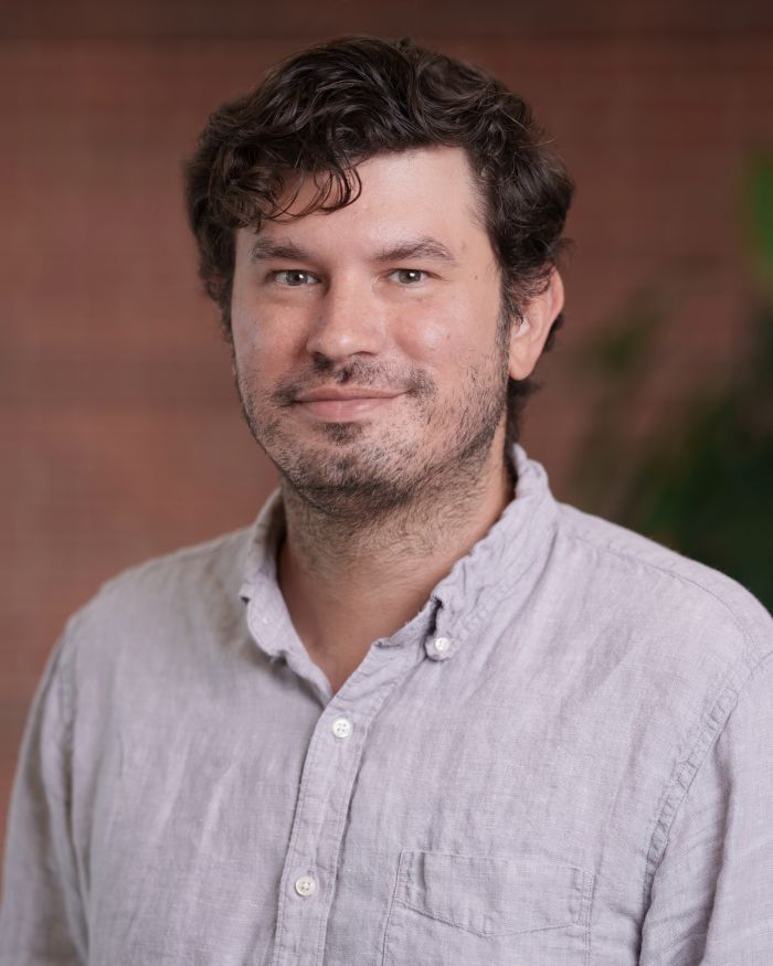 Justin Cook, Director of the Master's Program in Political Economy