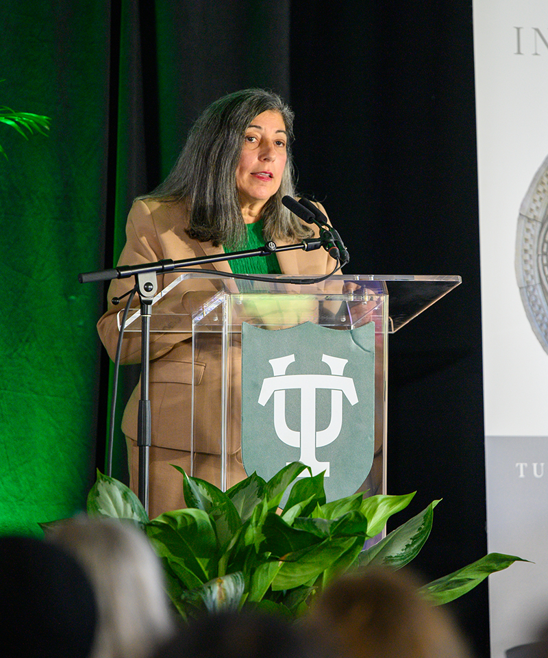 Dr. Deb Houry speaks at a podium at the 2026 Yates Lecture.
