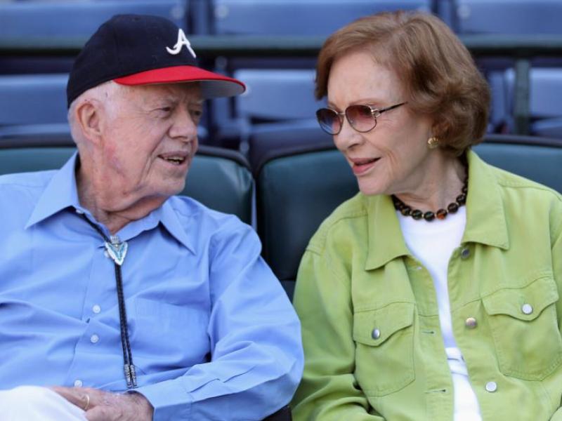 Former President Jimmy Carter and wife Rosalyn talking