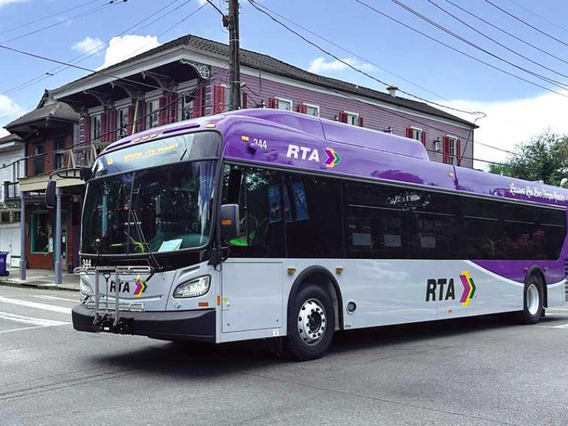 City bus travels across an intersection in New Orleans