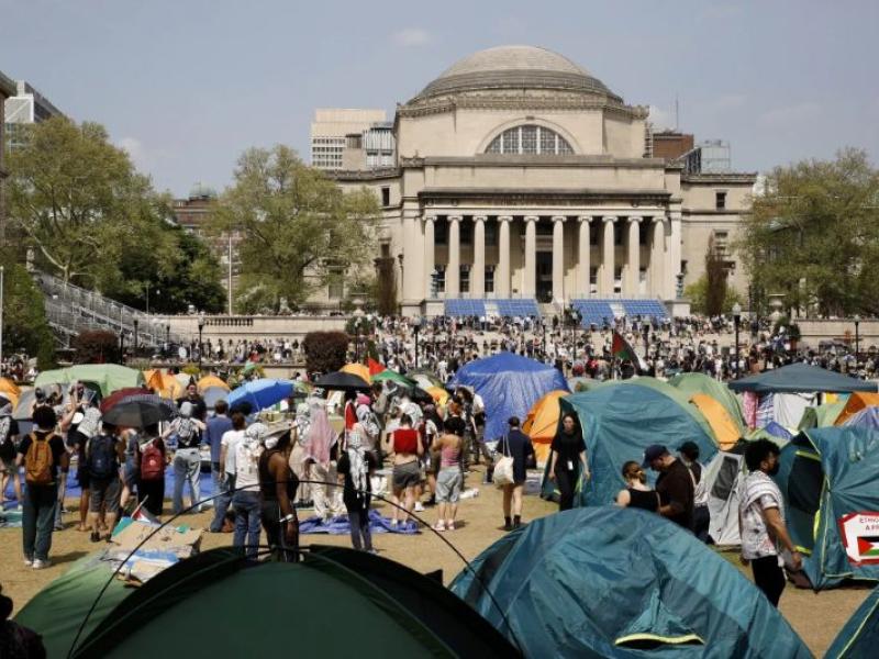 Student protesters gather inside their encampment on the Columbia University campus, April 29, 2024, in New York