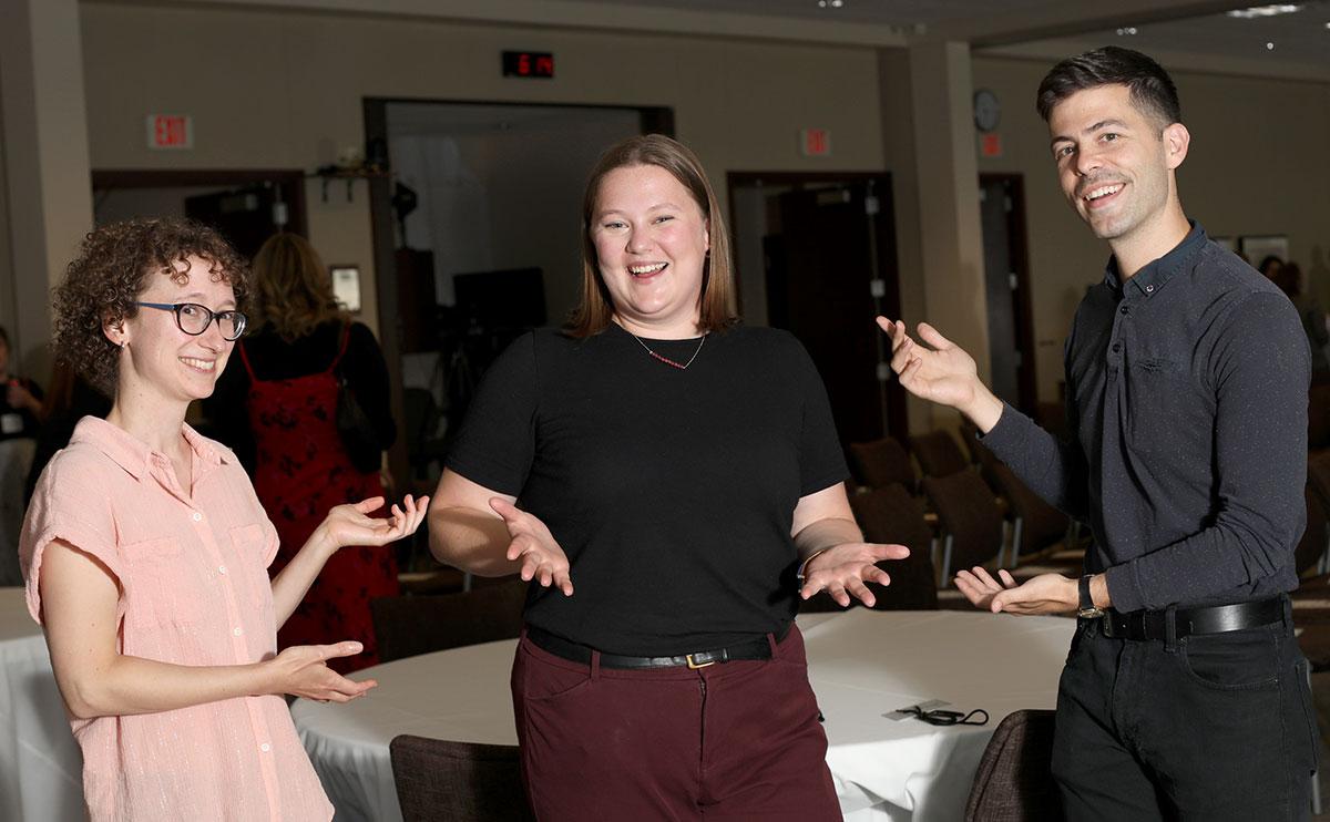 Mary Berg (center) with attorneys Scott Thompson (right) and Elizabeth Pierson of Law Forward (left).