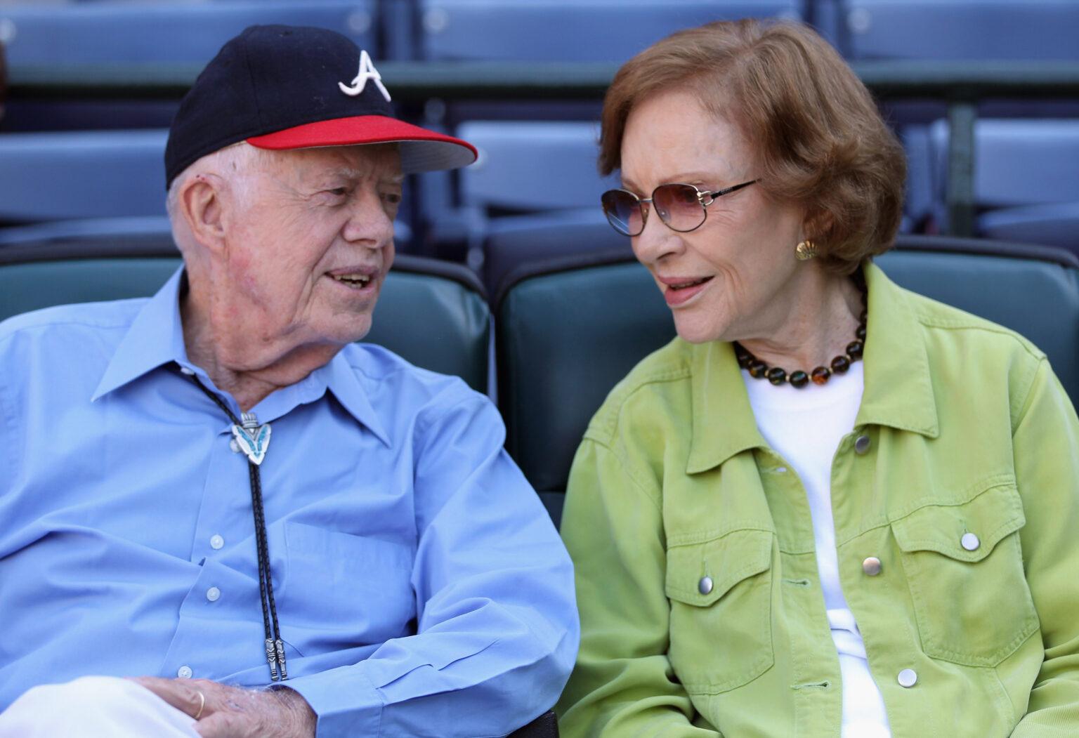 Former President Jimmy Carter and wife Rosalyn talking