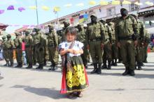 small child and military parade