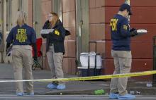 Three FBI agents investigating a cooler found on Bourbon Street in New Orleanss