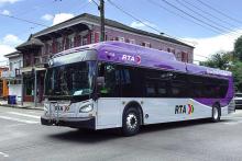 City bus travels across an intersection in New Orleans