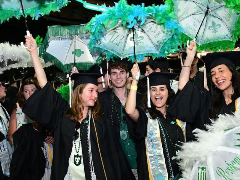 Happy graduates celebrate at the 2025 Unified Commencement